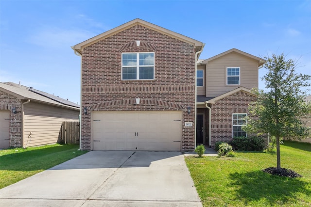 front facade featuring a front lawn and a garage