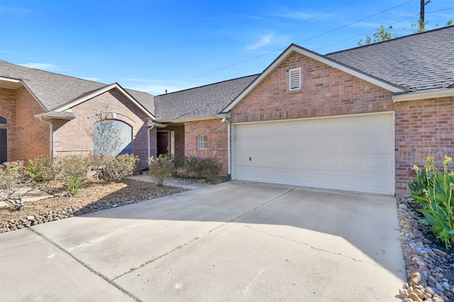 ranch-style home with a garage