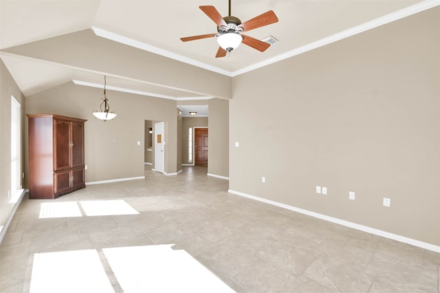 empty room with vaulted ceiling, ceiling fan, and ornamental molding