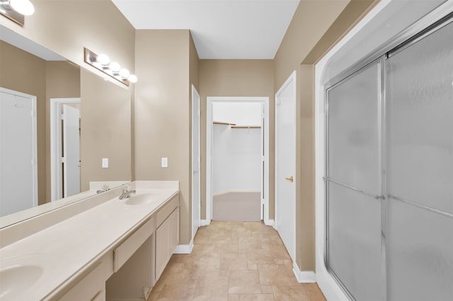 bathroom with vanity and walk in shower