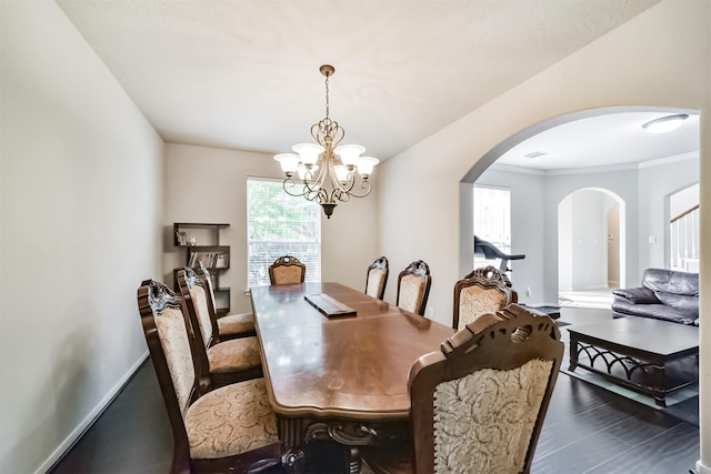 dining room featuring a chandelier and ornamental molding