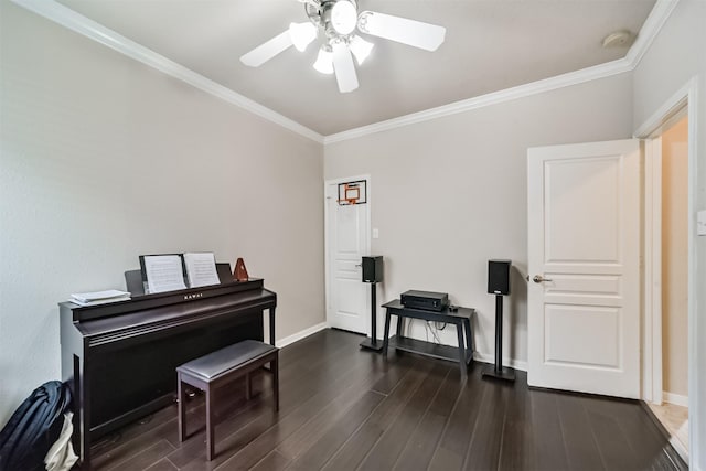 miscellaneous room featuring ceiling fan, ornamental molding, and dark wood-type flooring