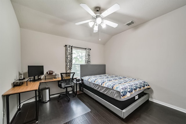 bedroom with ceiling fan, dark hardwood / wood-style floors, and lofted ceiling