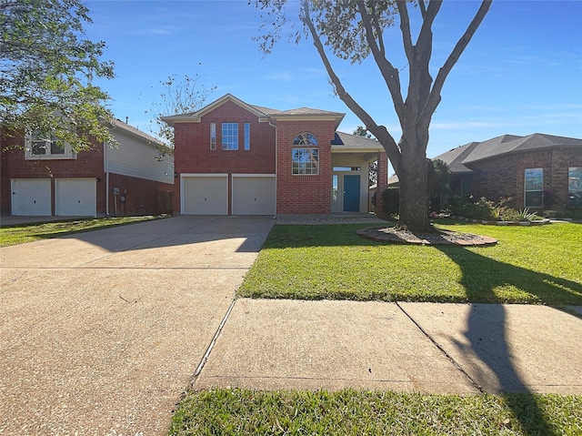 18131 Dusty Terrace Ln, Katy, TX 77449 - traditional home with a garage, a front yard, driveway, and brick siding