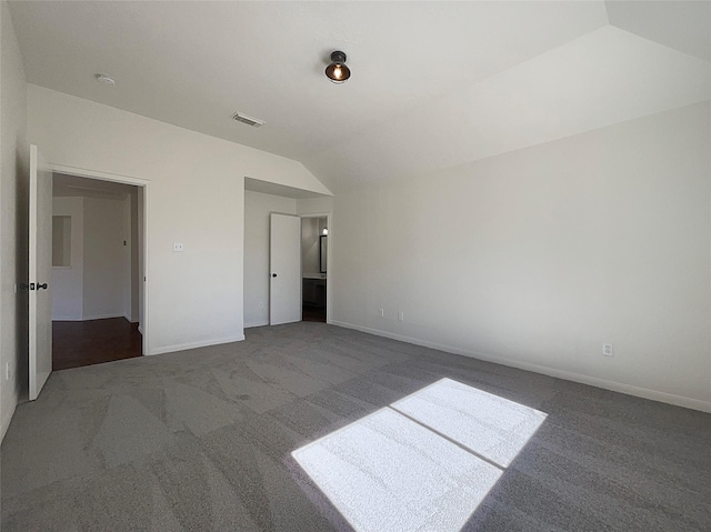 18131 Dusty Terrace Ln, Katy, TX 77449 - unfurnished bedroom featuring carpet, baseboards, vaulted ceiling, and visible vents