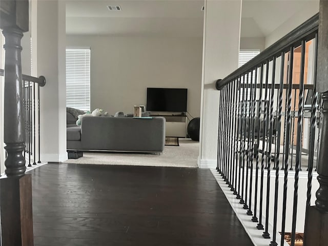 living room featuring dark hardwood / wood-style floors