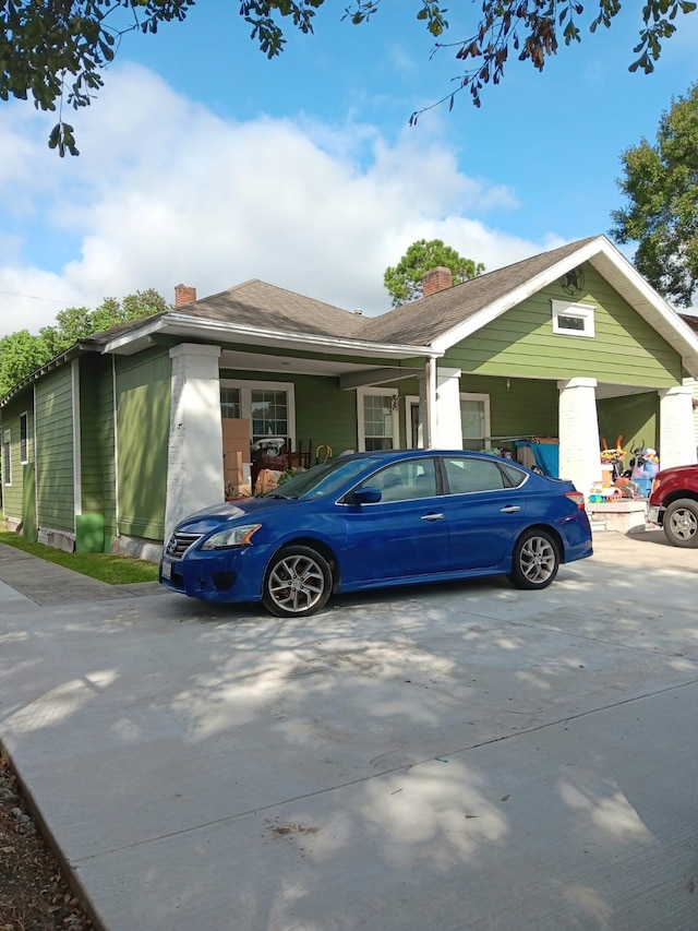 view of home's exterior featuring a porch