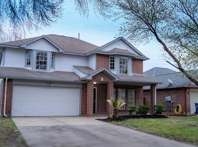 front of property featuring a garage