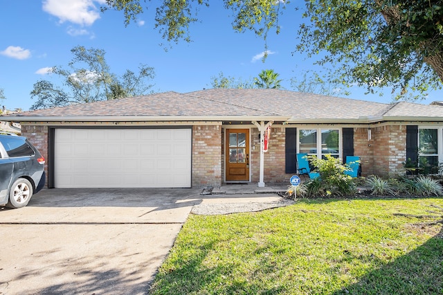 single story home with a garage and a front yard