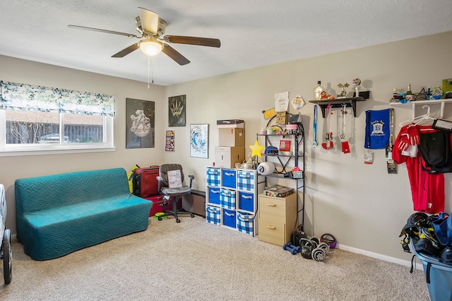 4515 Ponca St, Pasadena, TX 77504 - sitting room with carpet flooring, a ceiling fan, and baseboards