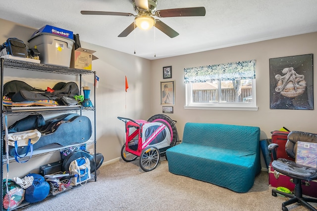 4515 Ponca St, Pasadena, TX 77504 - sitting room featuring carpet floors, ceiling fan, and baseboards
