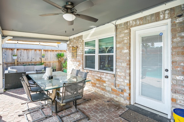 view of patio featuring ceiling fan