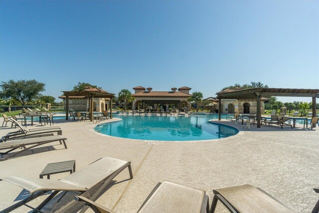 view of pool featuring a gazebo and a patio area