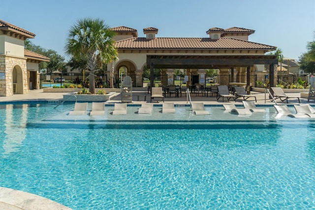 view of swimming pool with a patio area