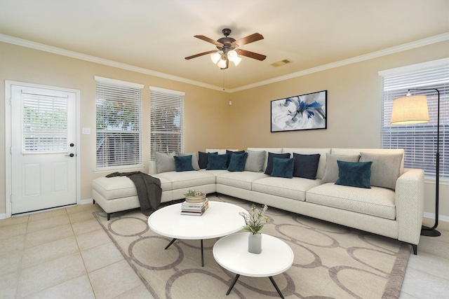 tiled living room featuring ceiling fan and ornamental molding