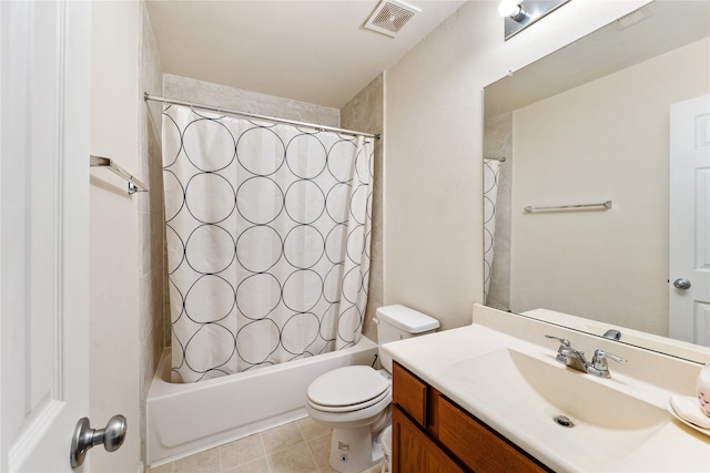 full bathroom with tile patterned flooring, shower / bath combo, vanity, and toilet