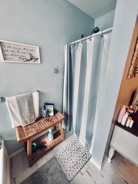 bathroom with curtained shower