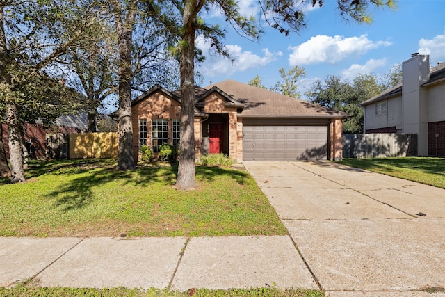 view of front facade featuring a garage and a front lawn