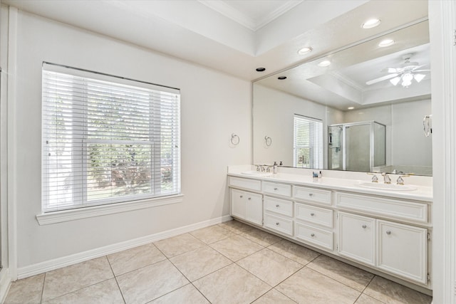 bathroom with tile patterned floors, ceiling fan, a shower with shower door, and a wealth of natural light