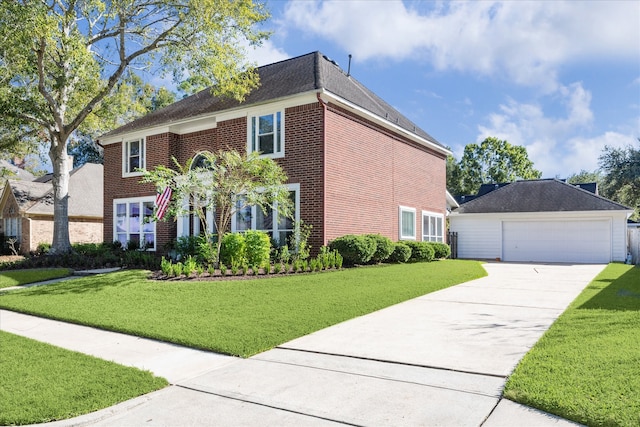 colonial home with a front lawn and a garage