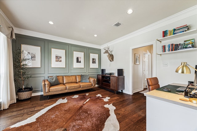 living room featuring dark hardwood / wood-style flooring and ornamental molding