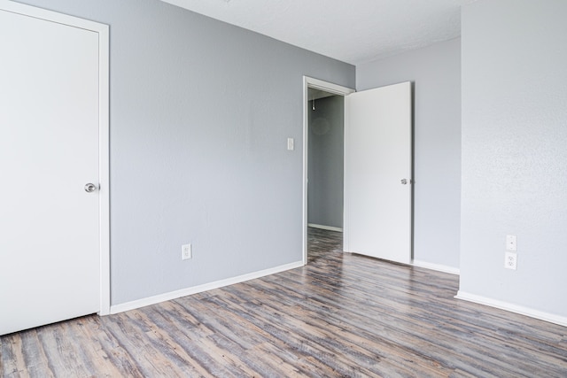 spare room featuring hardwood / wood-style floors