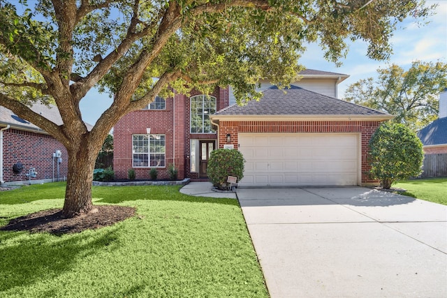 traditional-style house featuring an attached garage, brick siding, a shingled roof, concrete driveway, and a front yard