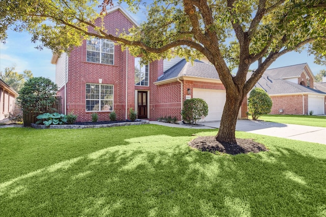 traditional home with a front yard, concrete driveway, brick siding, and an attached garage