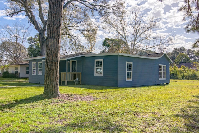 exterior space with a yard