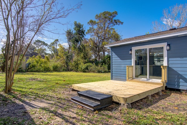 view of yard with a wooden deck