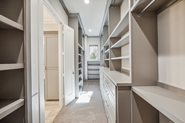 spacious closet with light tile patterned flooring