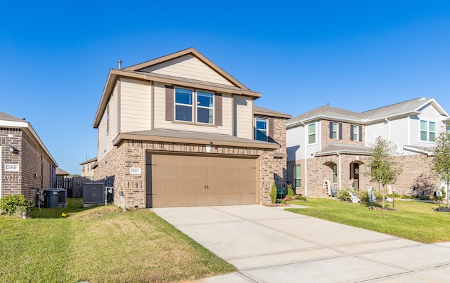 view of front of house featuring a garage and a front yard