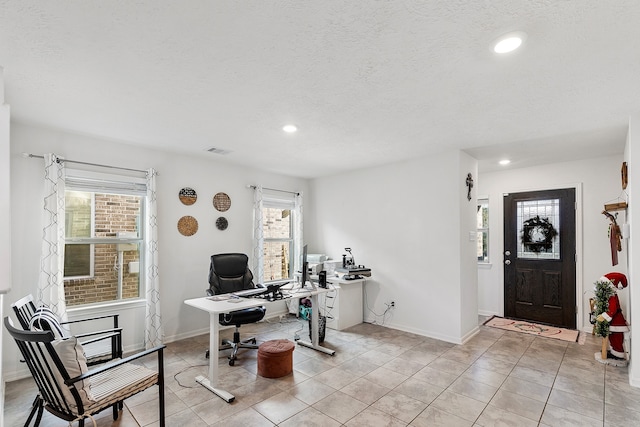 home office featuring light tile patterned flooring