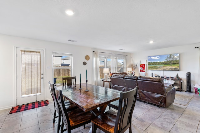 view of tiled dining space