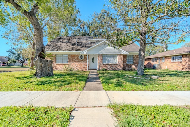 ranch-style house with a front yard