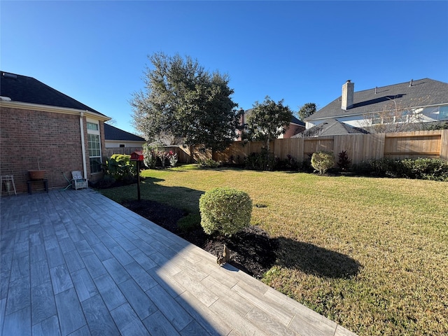 view of yard with a patio area