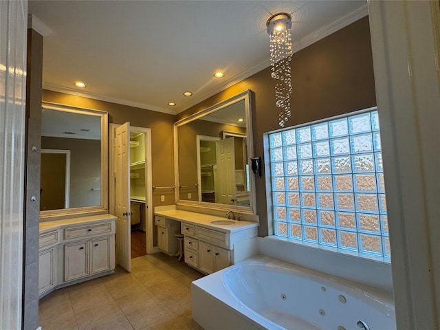 bathroom featuring tile patterned flooring, vanity, a washtub, and crown molding