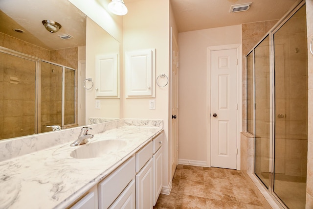 bathroom featuring vanity and walk in shower