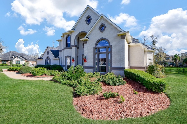 view of front of home with a front lawn