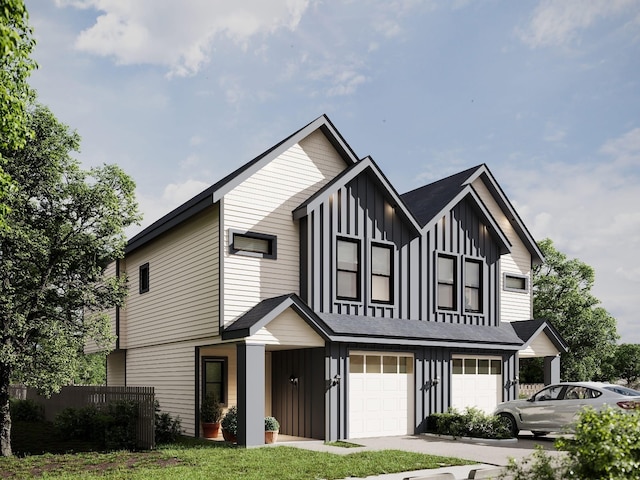 view of front of home featuring a garage and a front lawn