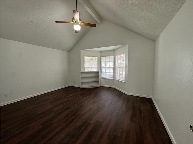 bonus room with vaulted ceiling with beams, dark hardwood / wood-style floors, ceiling fan, and a textured ceiling