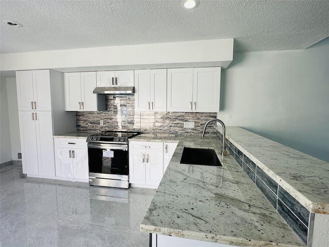 kitchen featuring stainless steel electric stove, light stone counters, white cabinetry, and sink