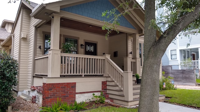 entrance to property with covered porch