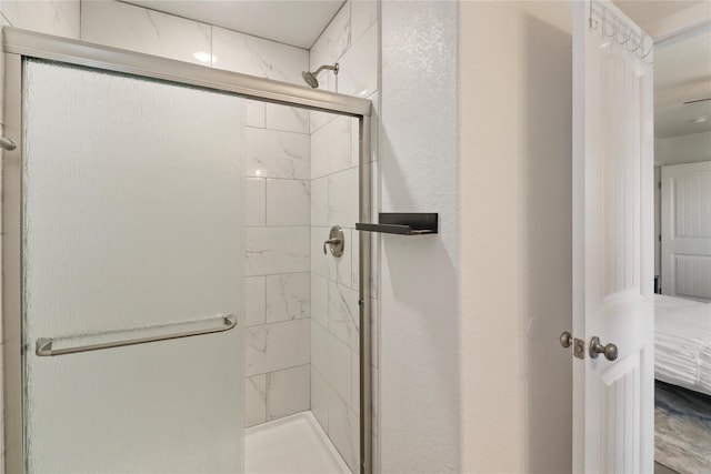 bathroom with an enclosed shower