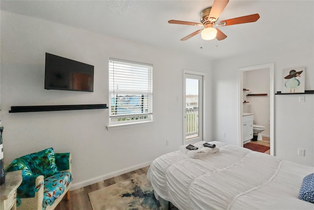 bedroom with hardwood / wood-style flooring, ceiling fan, and ensuite bathroom