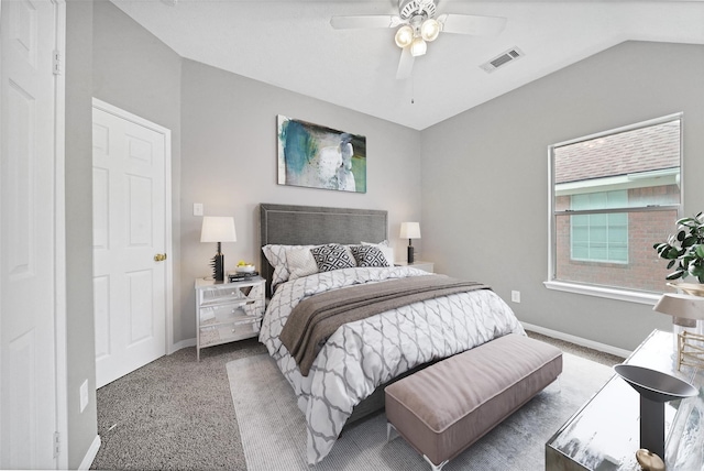 bedroom featuring ceiling fan, carpet floors, and lofted ceiling