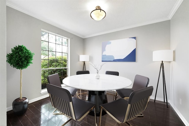 dining room featuring dark hardwood / wood-style flooring and ornamental molding