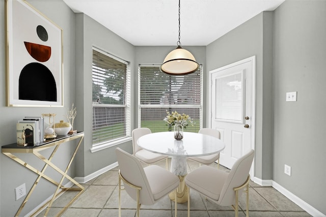 dining room with light tile patterned flooring