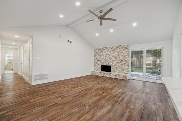 unfurnished living room featuring high vaulted ceiling, dark hardwood / wood-style floors, a stone fireplace, and ceiling fan