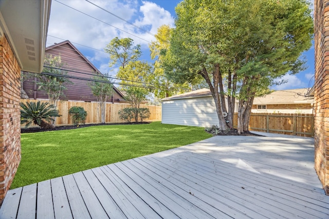 wooden deck with a yard